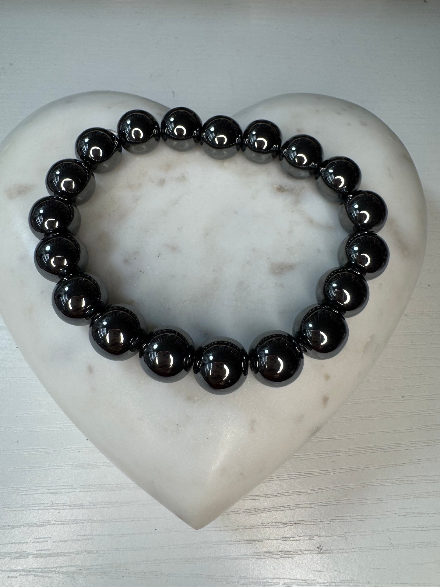 Unisex 12 mm hematite stone bracelet
