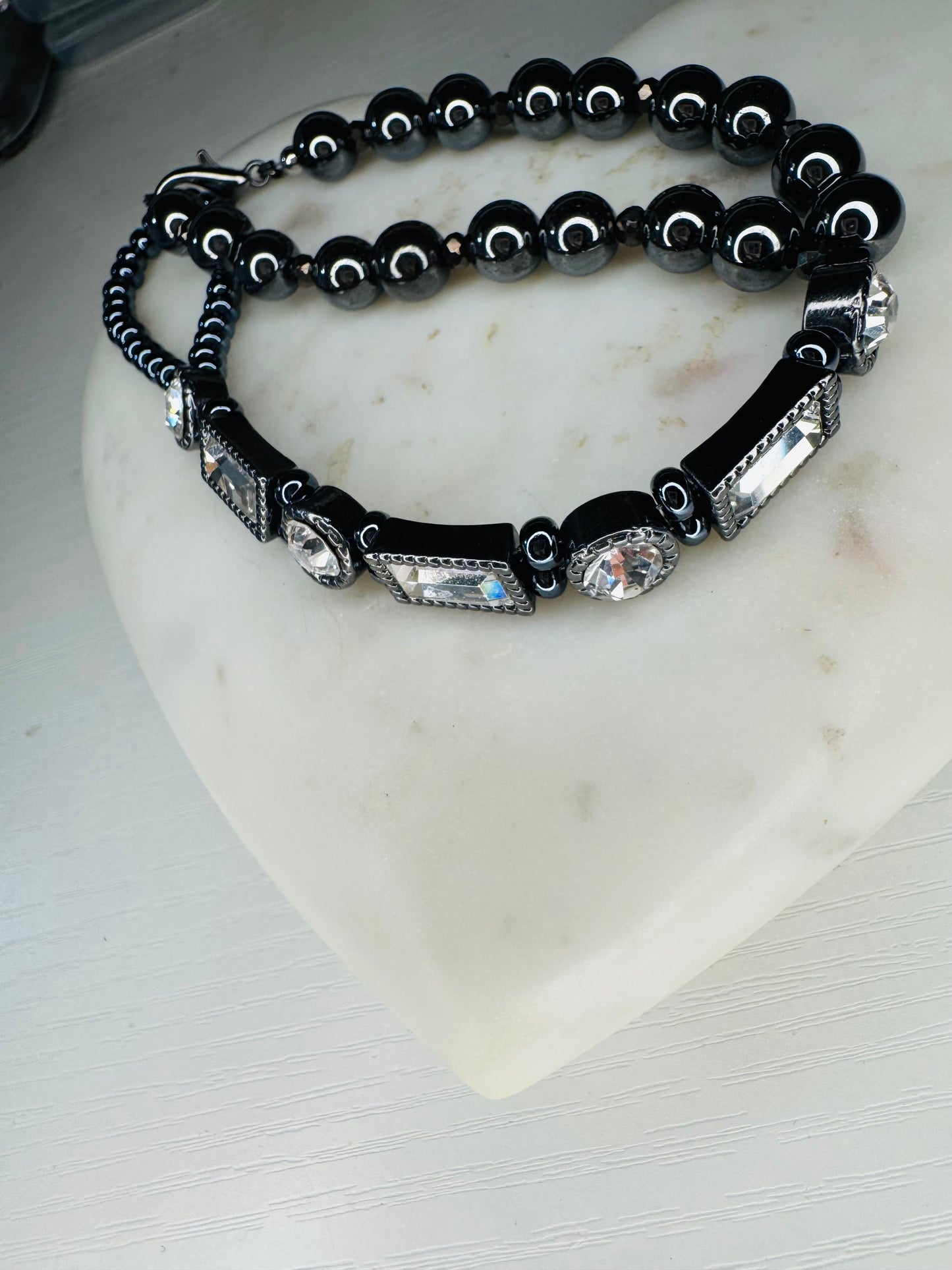 Custom-made handpiece with natural 8 mm hematite crystals