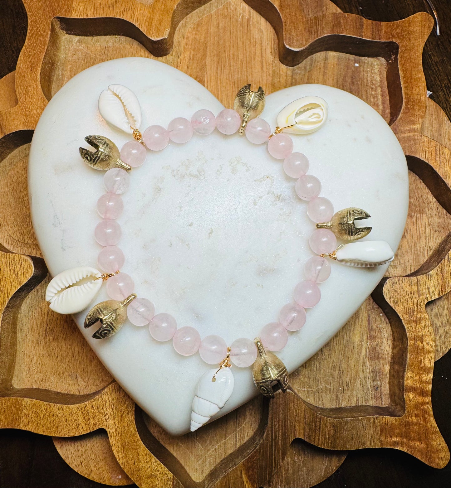 Rose quart bracelet with bells and seashells
