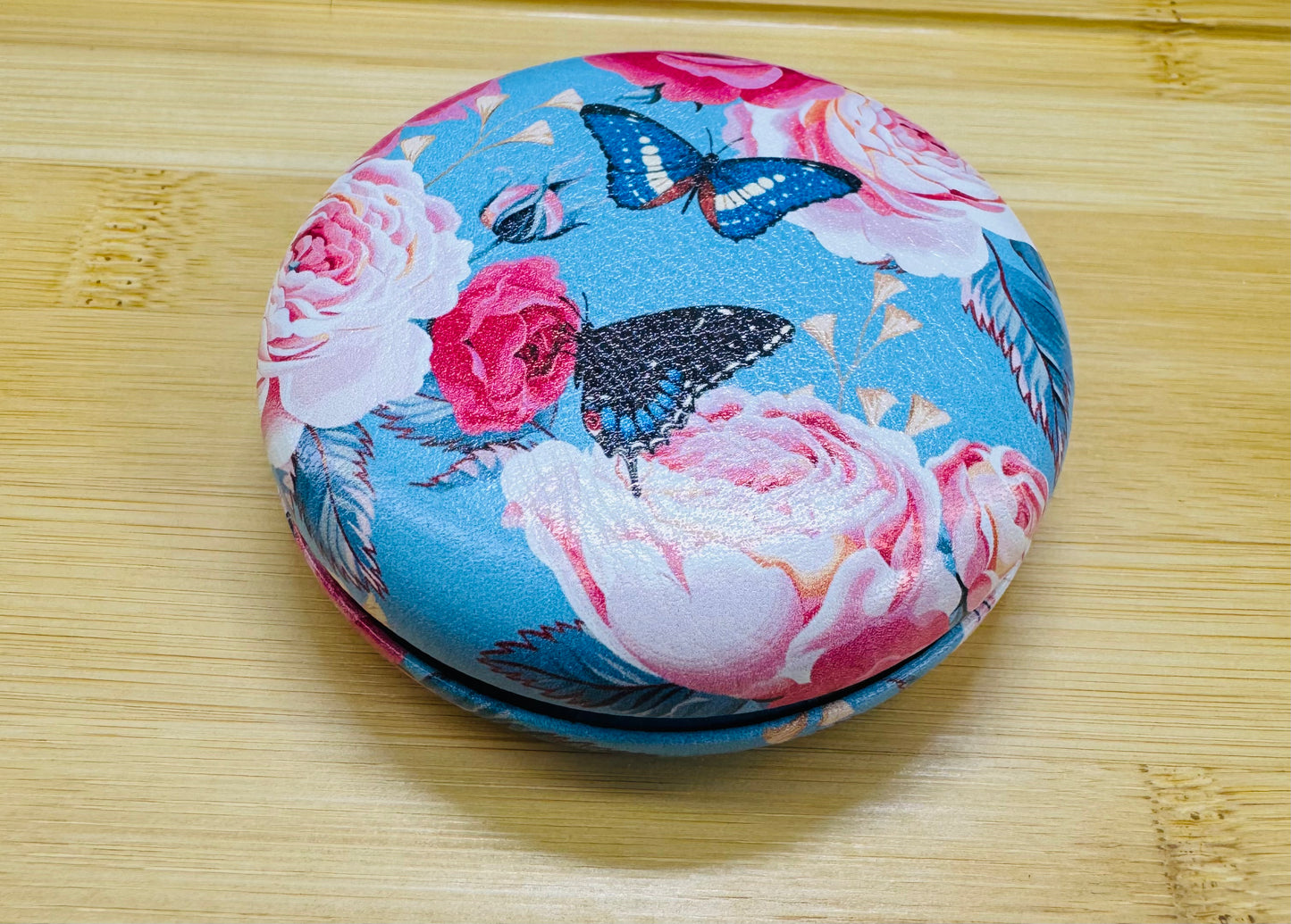 Cosmetic mirror with magnifying mirror and regular