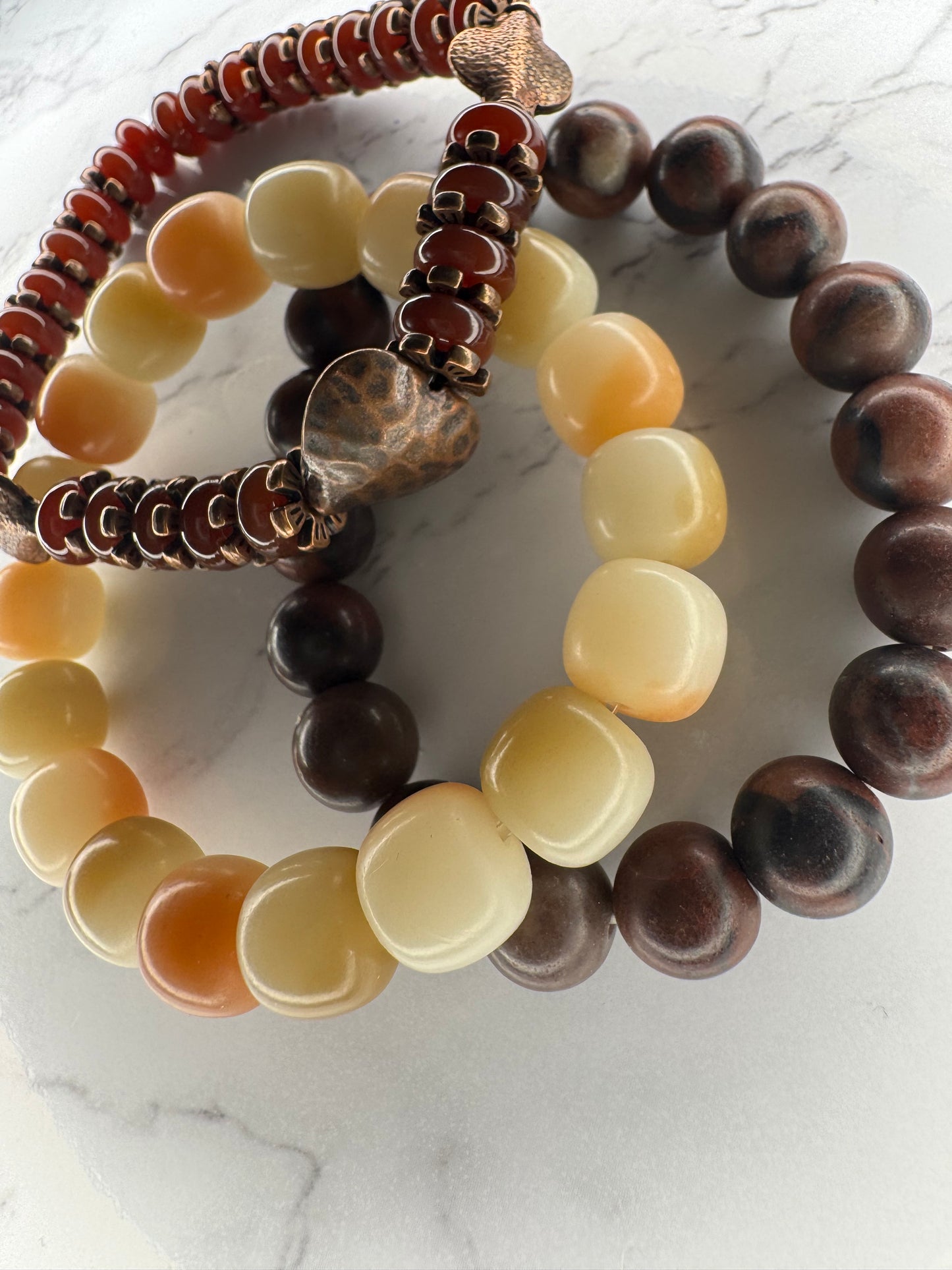 Three-piece bracelet set with copper heart