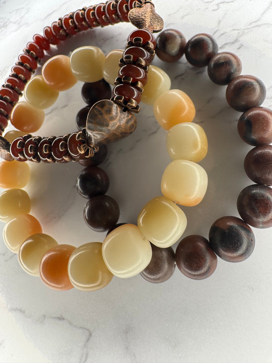 Three-piece bracelet set with copper heart