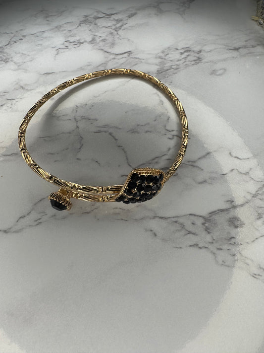 Gold bangle bracelet with black Onyx