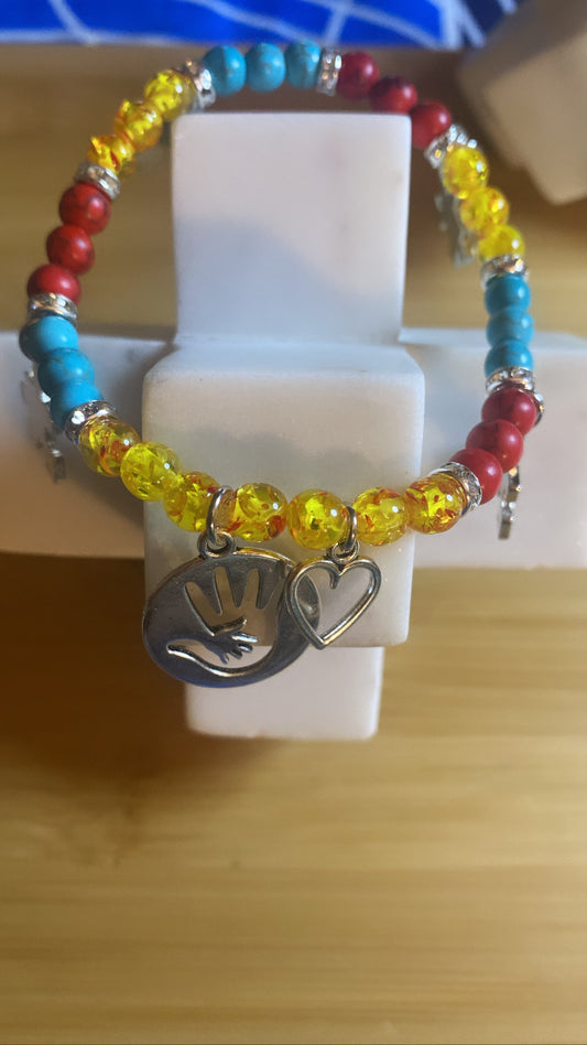 Autism awareness, bracelets pastor Reed