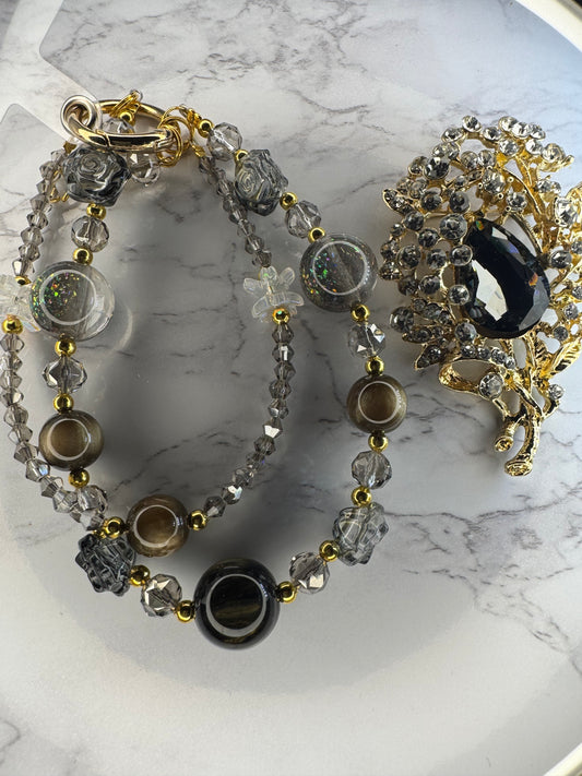 Phone charm with a pendant