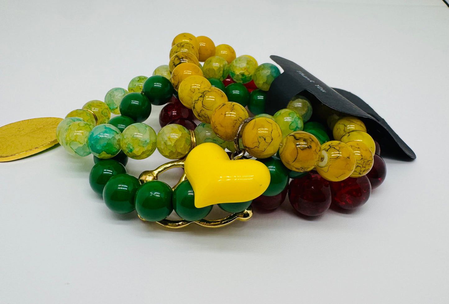 Four piece Christmas colors bracelet set
