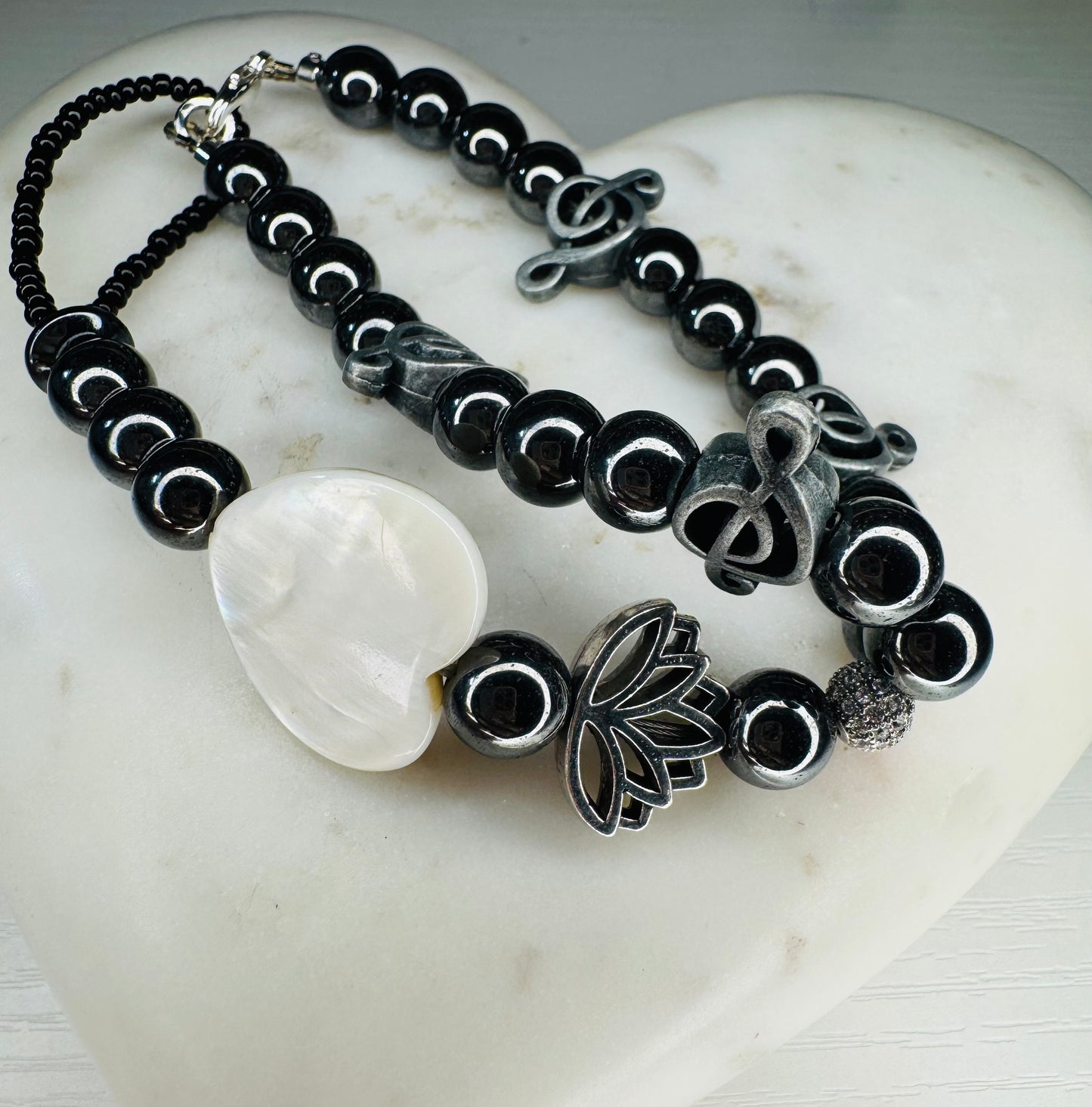 Music note custom-made handpiece with hematite crystals