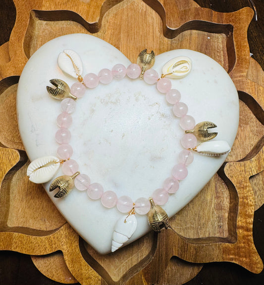 Rose quart bracelet with bells and seashells