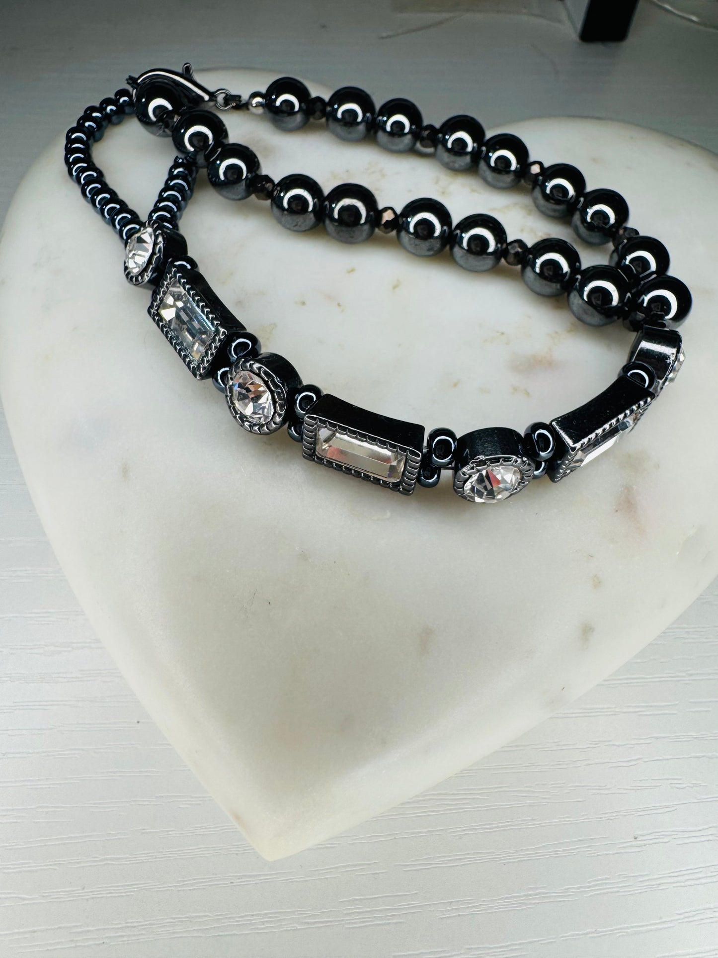 Custom-made handpiece with natural 8 mm hematite crystals