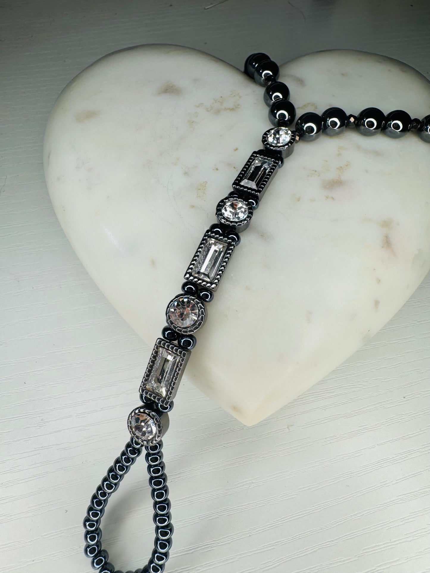 Custom-made handpiece with natural 8 mm hematite crystals