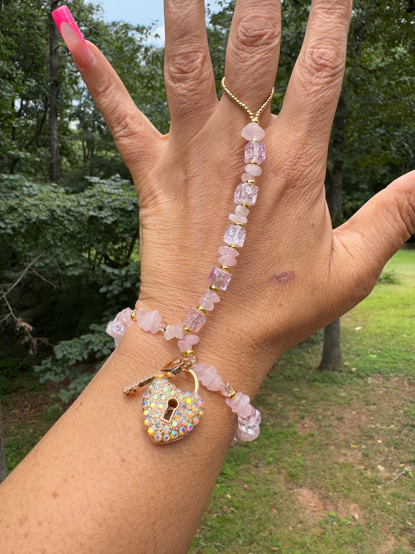 Custom made one of a kind pink ice hand adornment