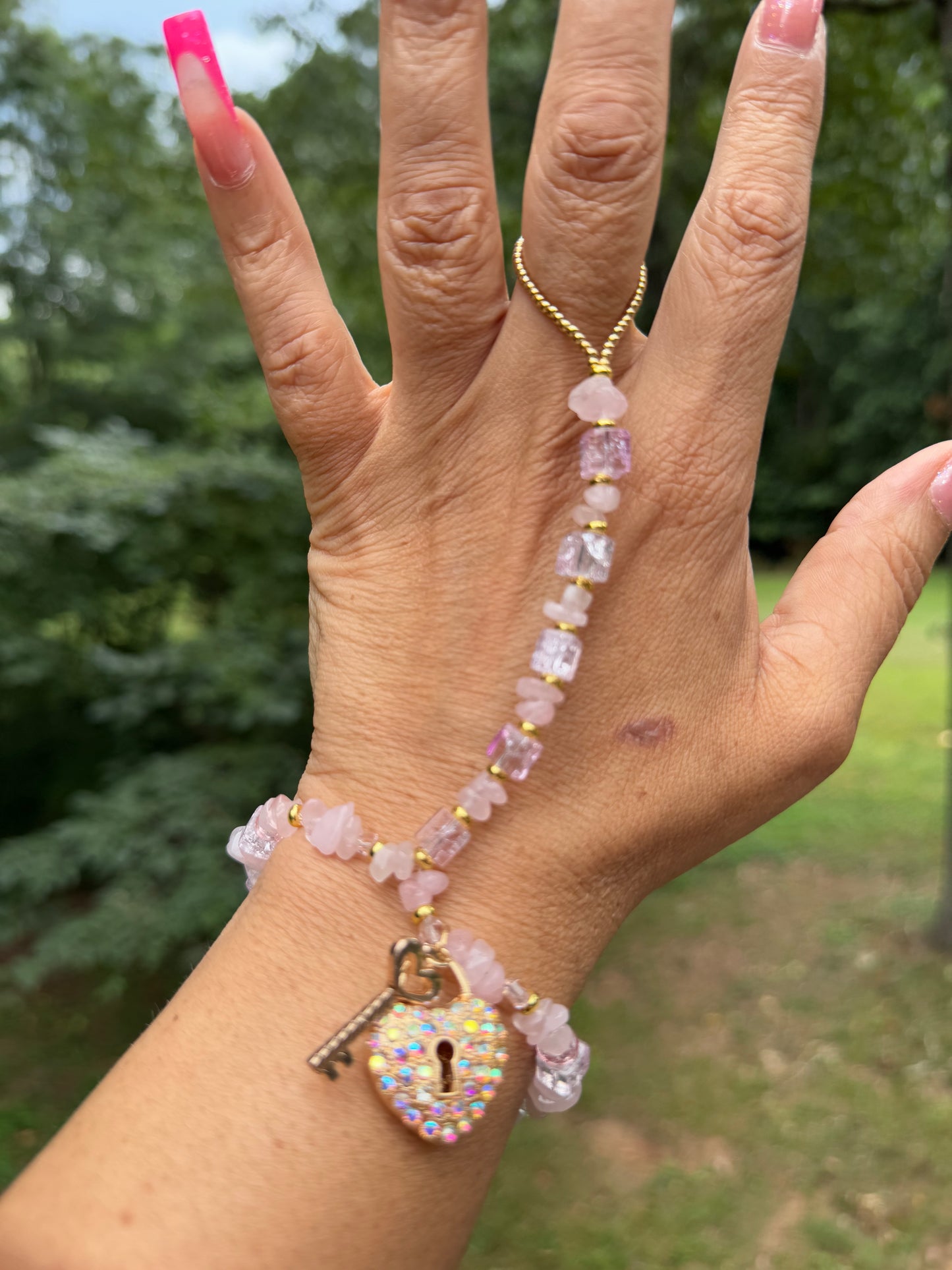 Custom made one of a kind pink ice hand adornment
