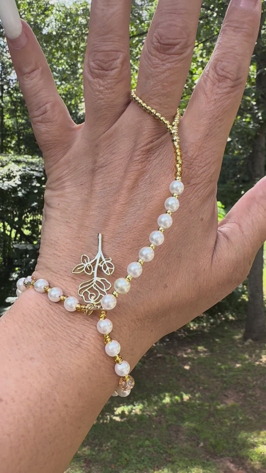 Custom made pearl hand adornment